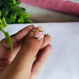 A handcrafted twisted gold ring symbolizing eternal love, grace, and timeless beauty.
