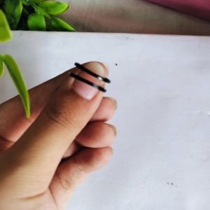 A sleek black double-line adjustable ring designed for minimal, everyday elegance.