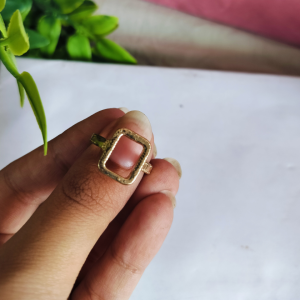 A chic gold textured square-outline adjustable ring with a minimal geometric finish — stylish, lightweight, and perfect for everyday wear.